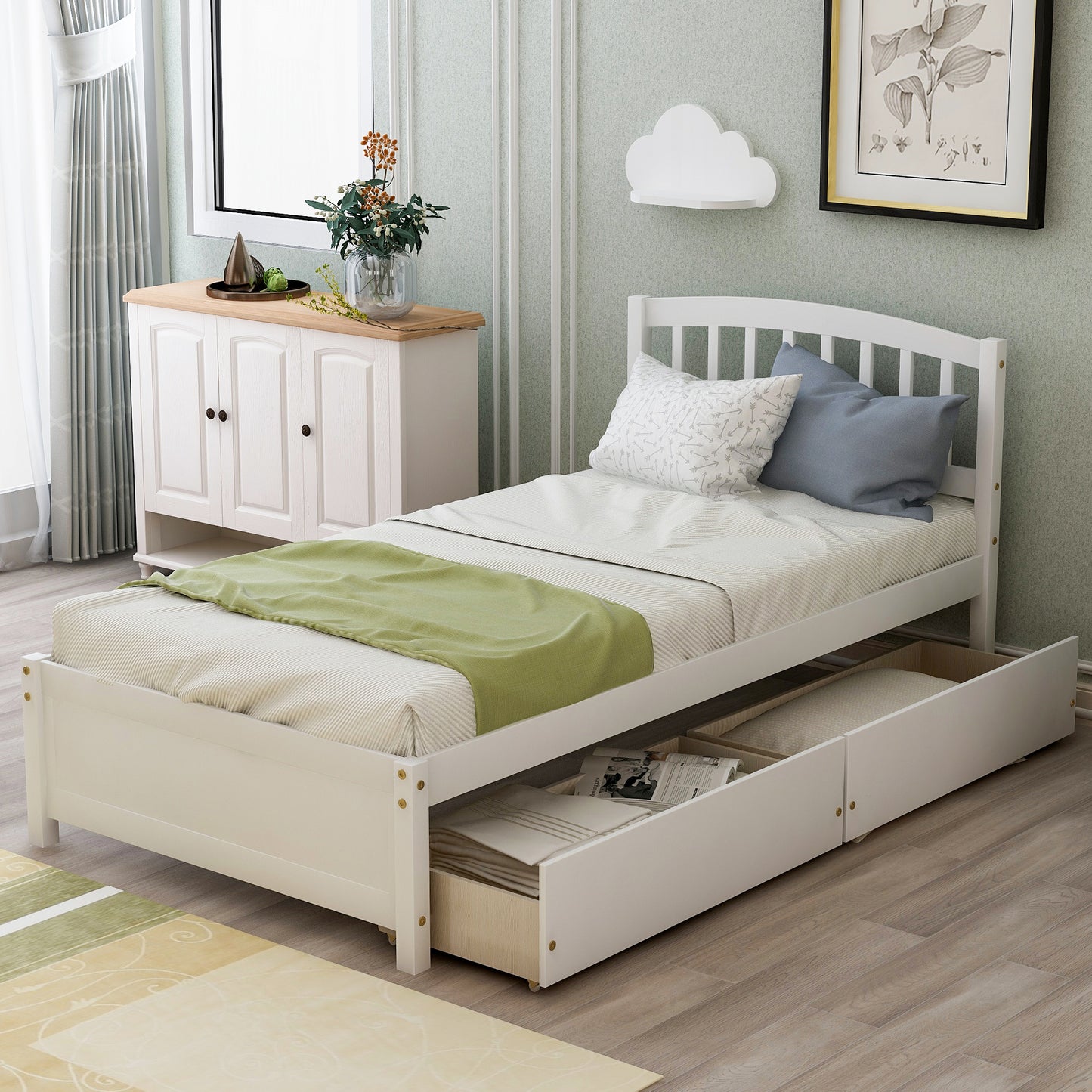 White wooden twin bed frame with two underbed storage drawers and a green accent throw