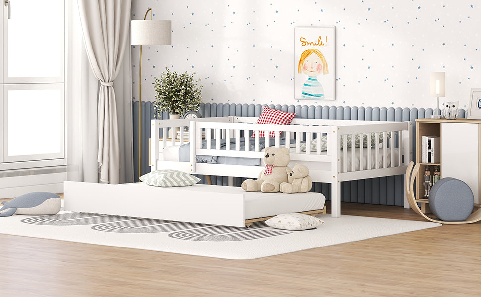 White wooden toddler bed with pullout trundle