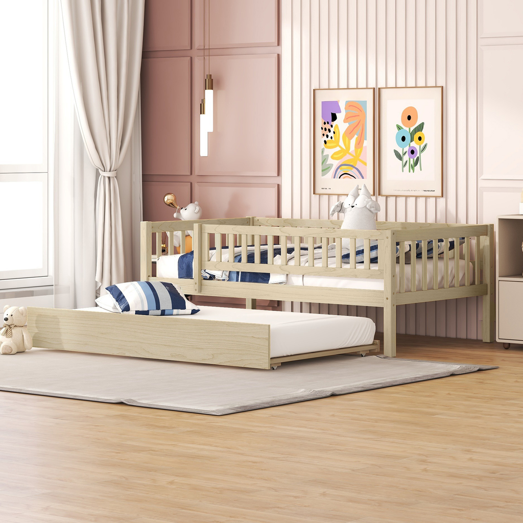 Light wood twin daybed with trundle featuring a slatted design and neutral bedding for a nursery