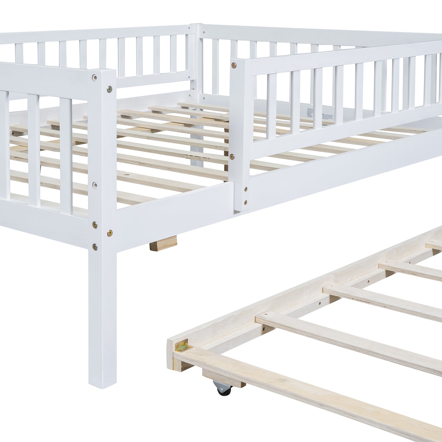 White wooden toddler bed frame with slat support and pullout trundle bed
