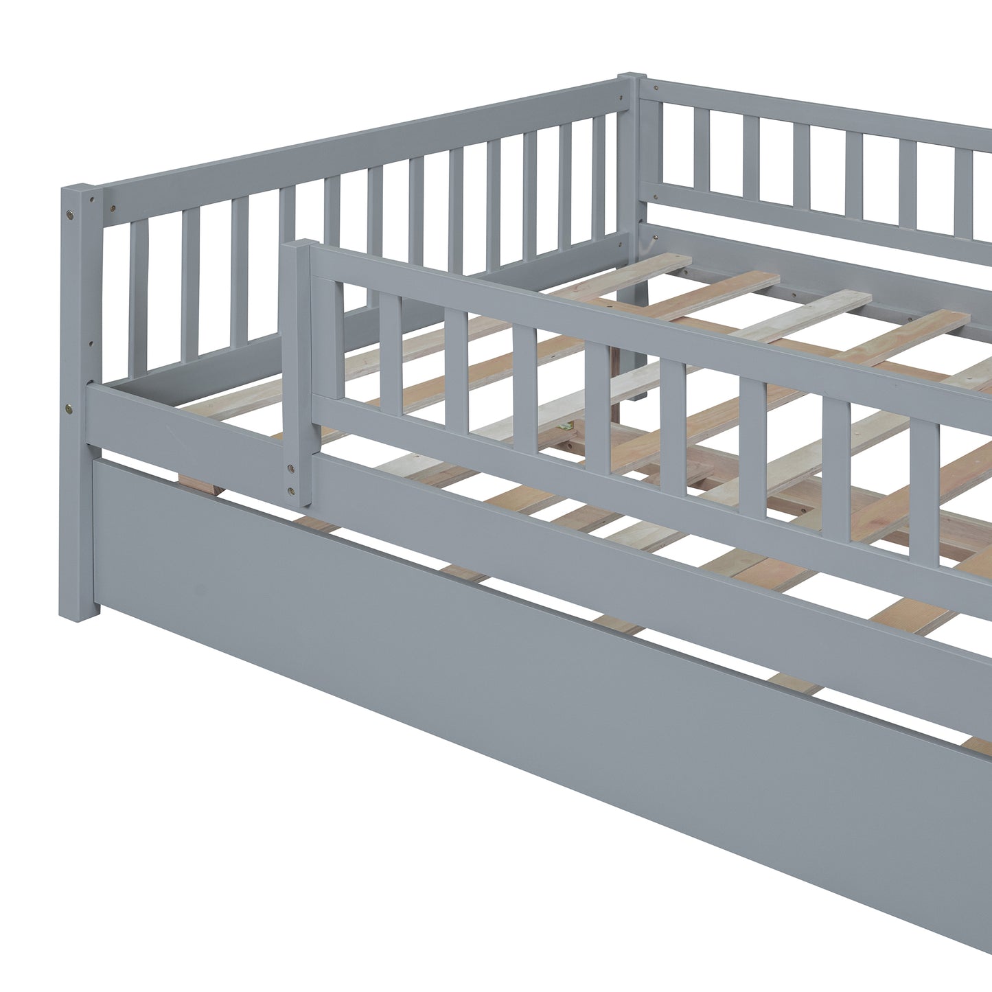 Closeup of grey wooden toddler bed frame with slats