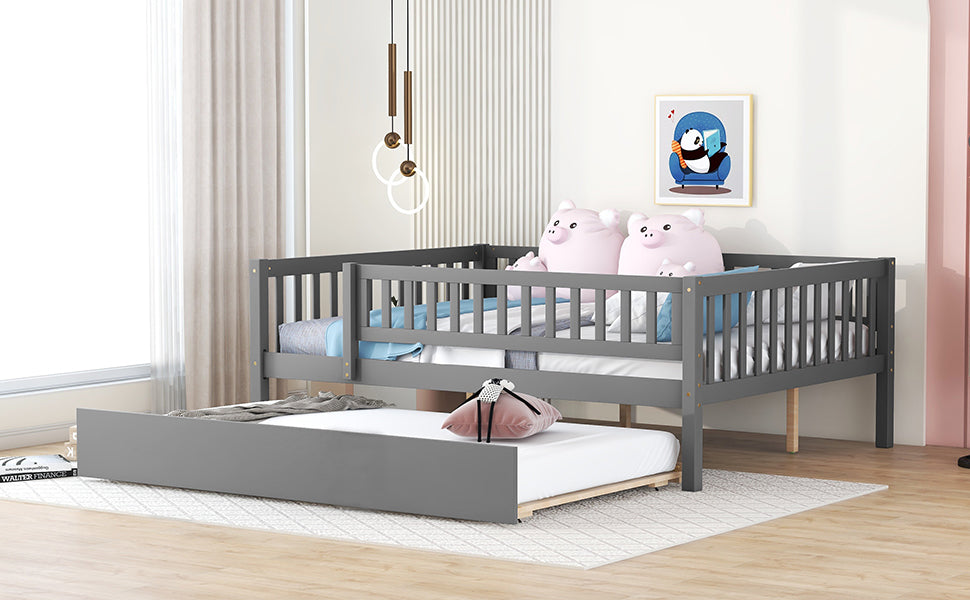 Gray wooden daybed with pullout trundle ideal for guest rooms or childrens rooms