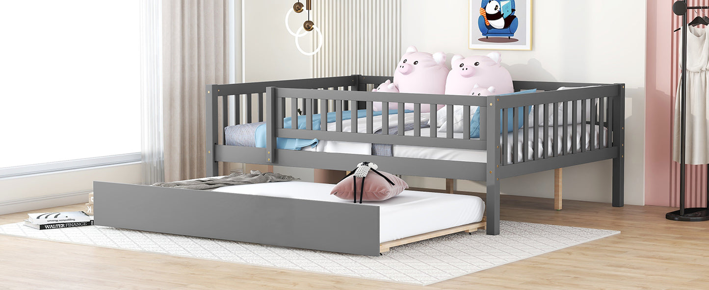 Grey wooden triple bunk bed with a pullout trundle