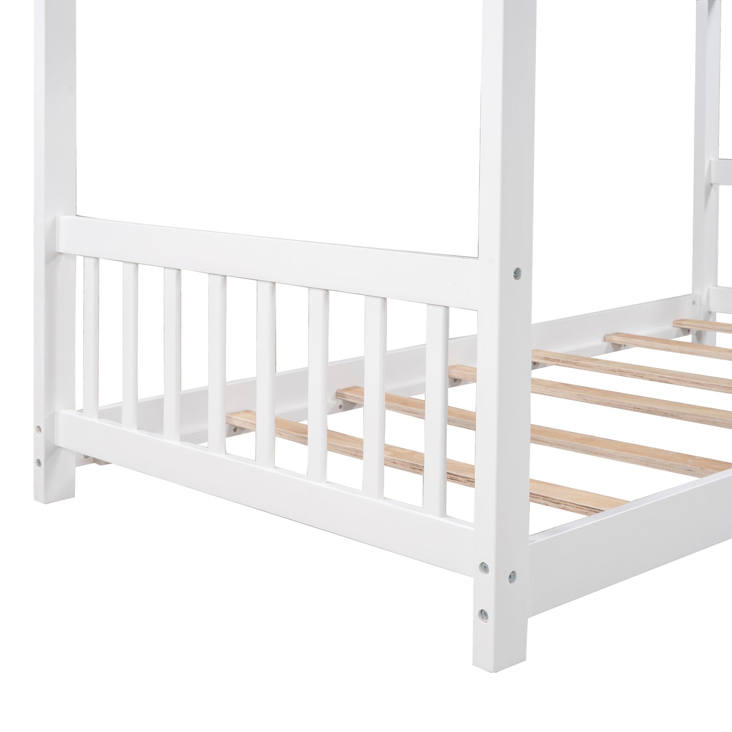 White wooden canopy bed frame detail with slatted mattress support