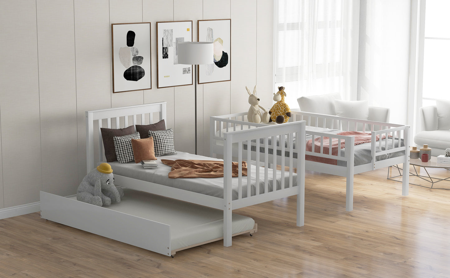 White twin bed with trundle featuring slatted sides and a grey mattress