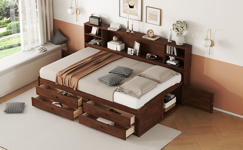 Dark wood platform bed with integrated headboard storage and numerous drawers