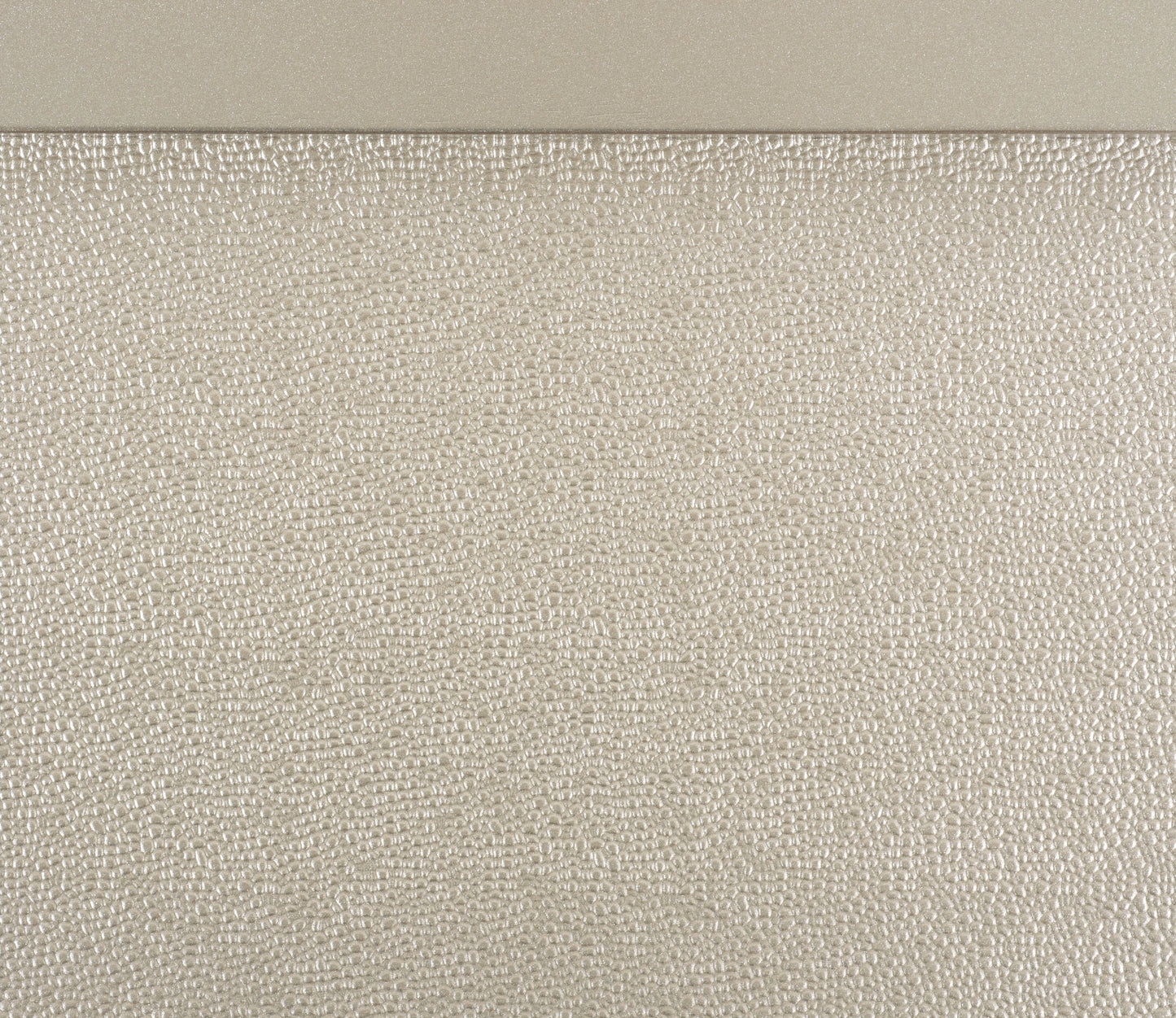 Textured champagne metallic wallpaper with a raised pebble pattern