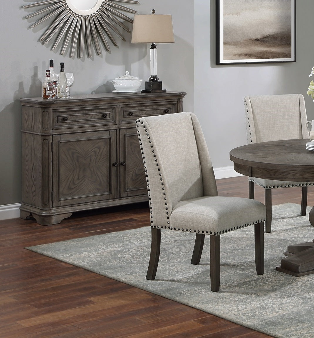 Gray wood buffet with decorative carving and two drawers