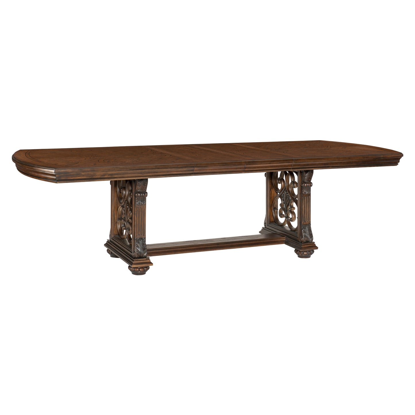 Ornate dark wood dining table with carved pedestal legs and detailed inlay top