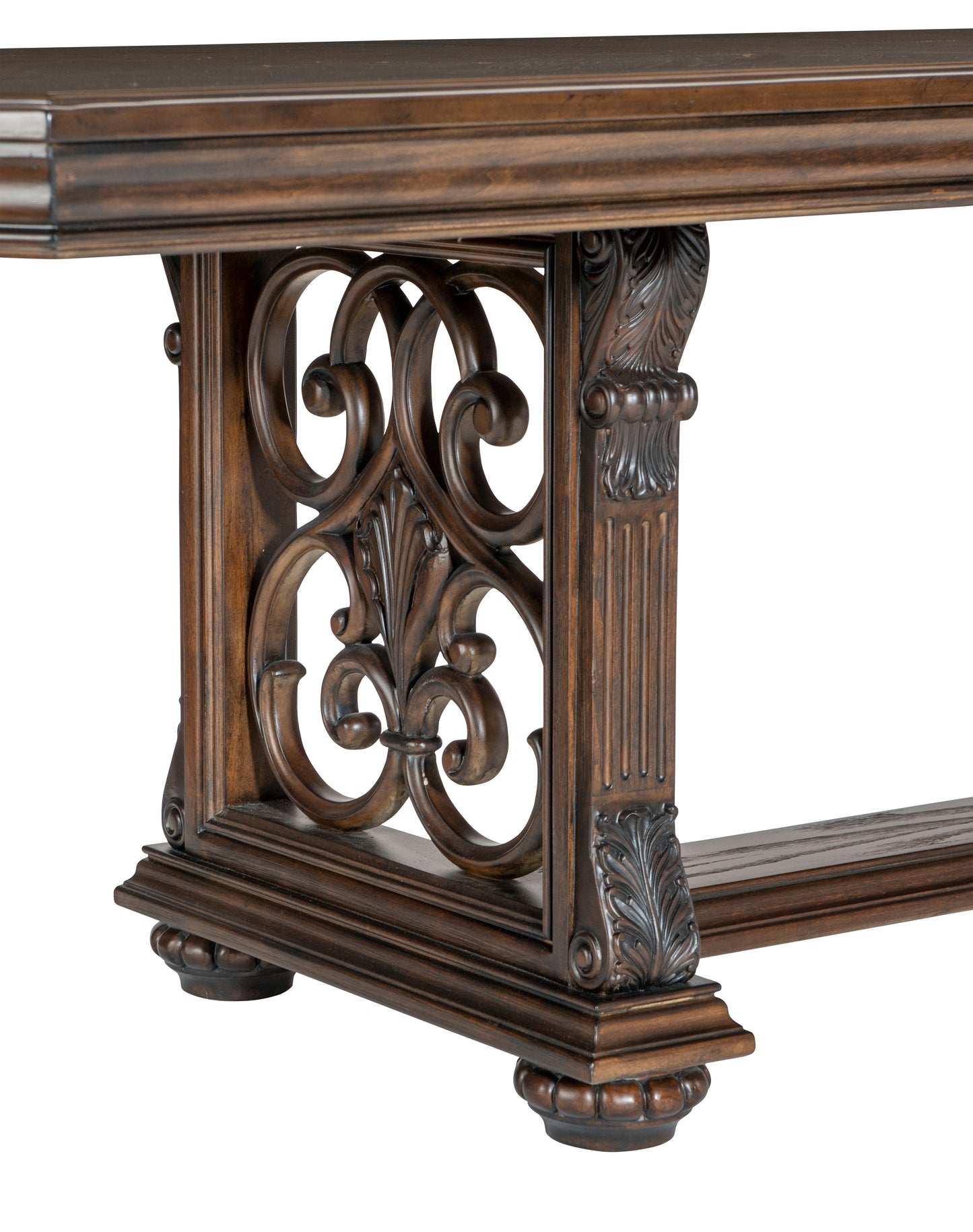 Dark wood ornate dining table leg with carved details