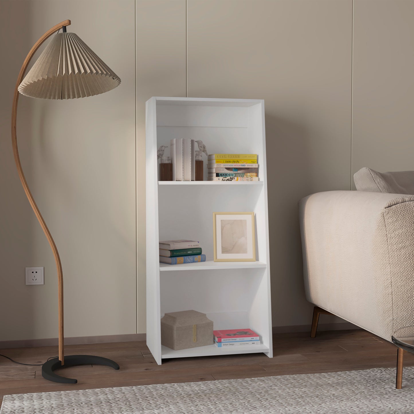 White modern minimalist bookshelf with three shelves storing books and decor