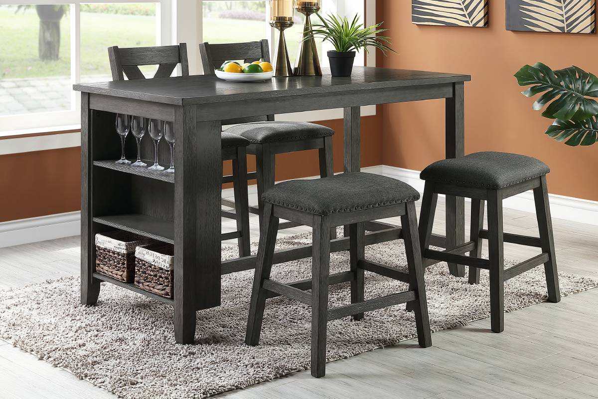 Gray wood counter height table with upholstered stools and builtin shelves