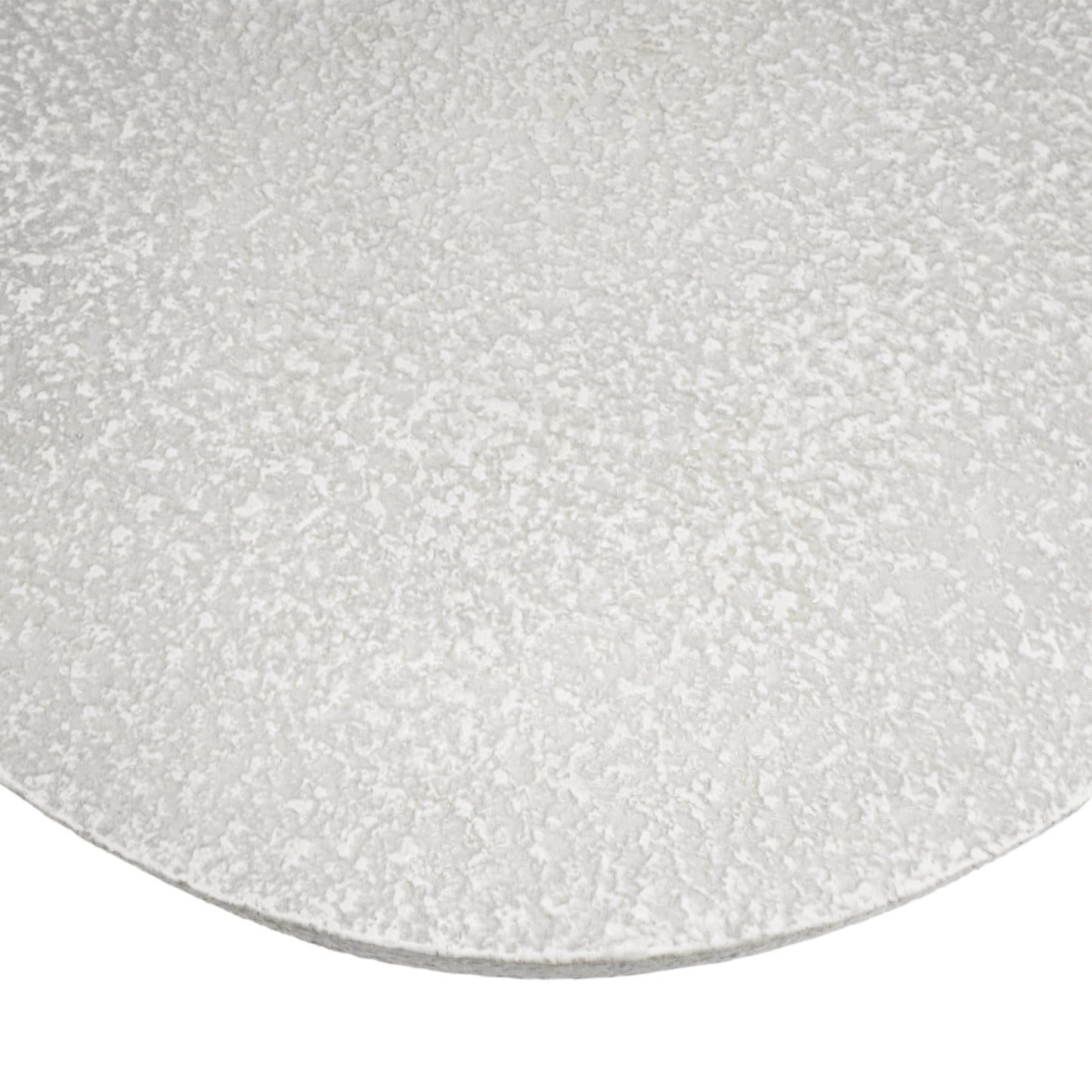 Textured white ceramic plate with speckled finish