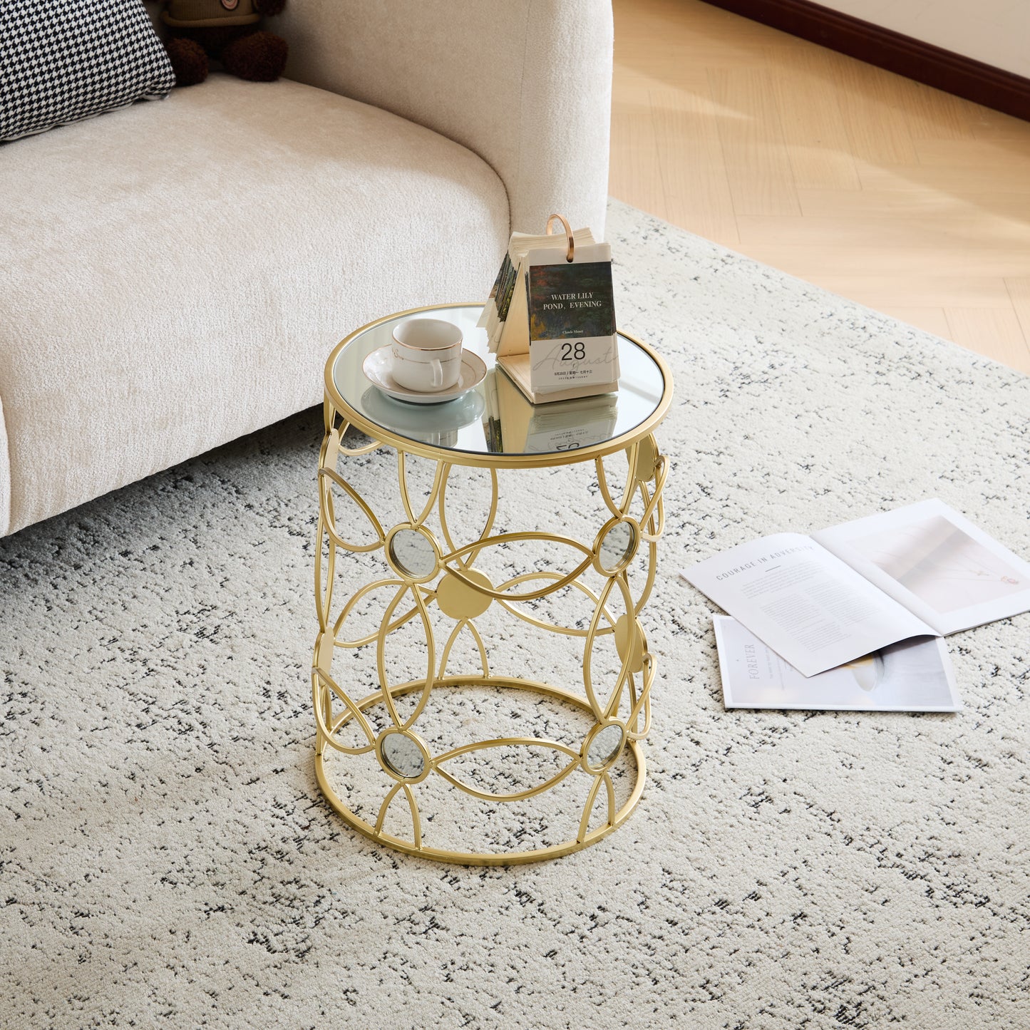 Gold geometric accent table with mirrored top