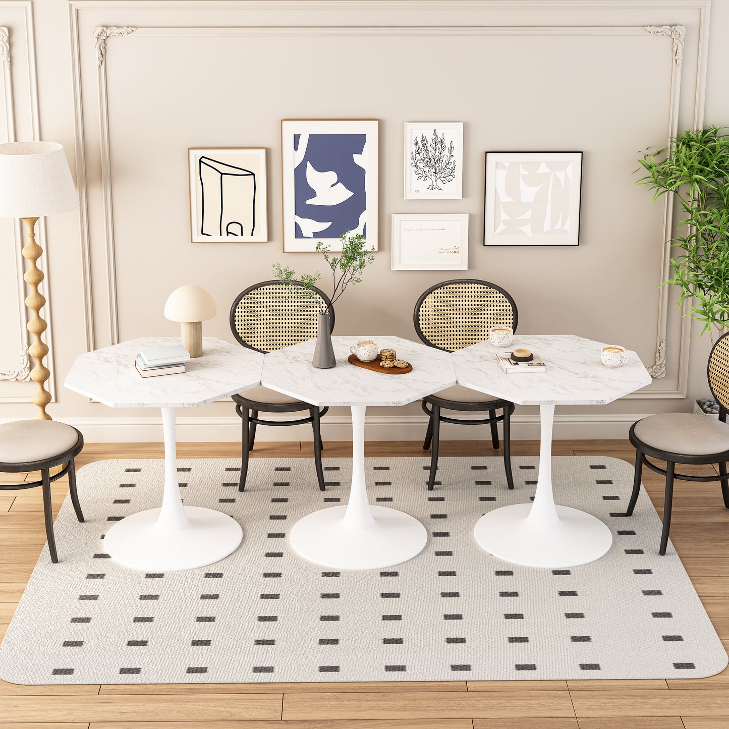 White marble octagonal tulip dining table with cane back chairs