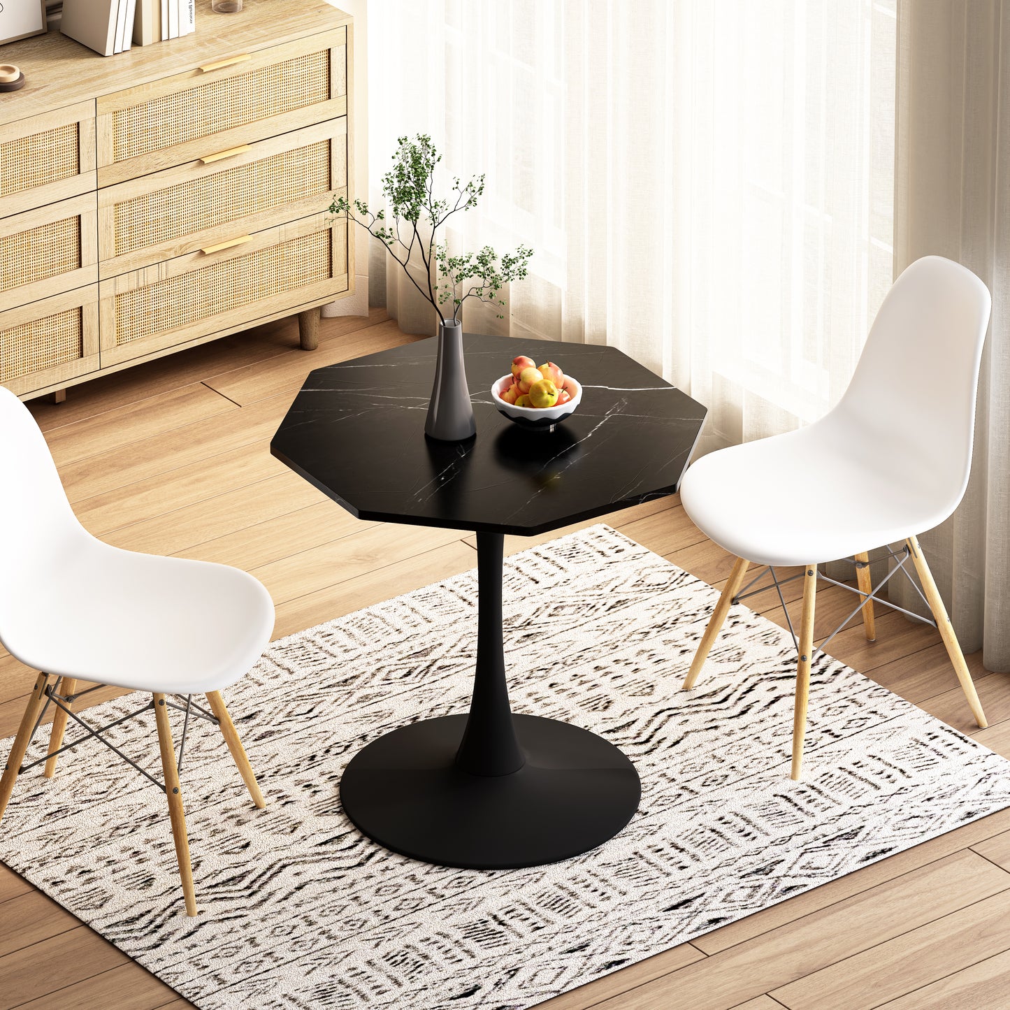Black marble pedestal dining table with white chairs