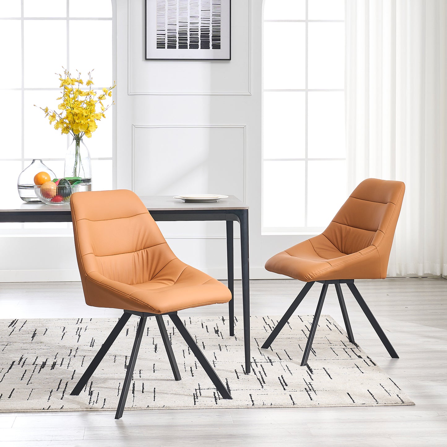 Tan leather dining chair with quilted back and black metal legs
