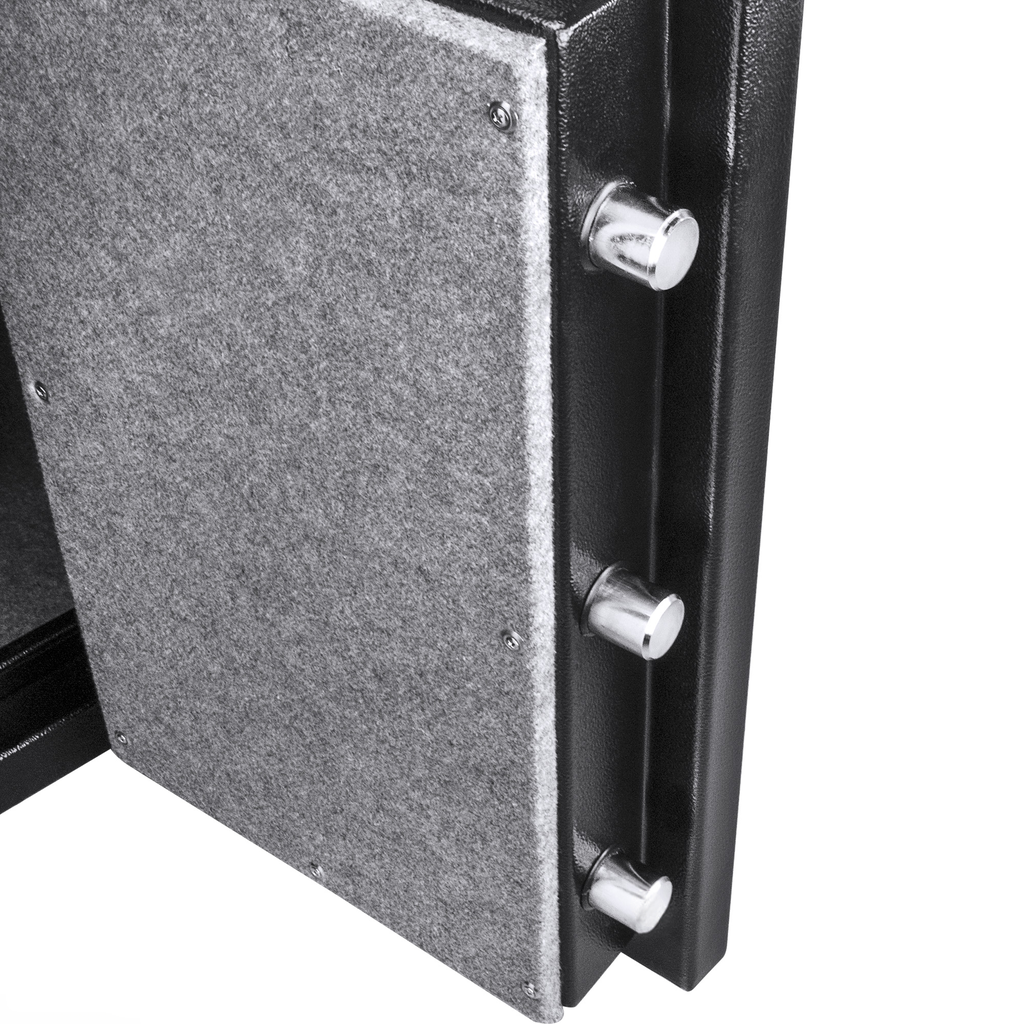 Closeup of three silver locking bolts on the exterior of an open black metal safe