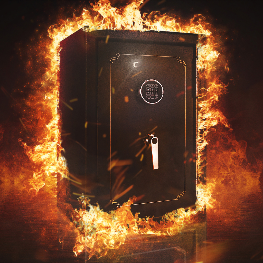Dark metal fireproof safe with digital keypad and handle surrounded by flames