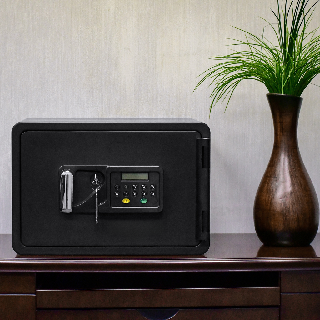 Black digital safe with keyhole and keypad