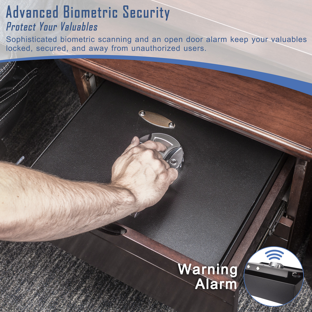 Hand opening a black biometric safe with a chrome handle set in a wooden desk