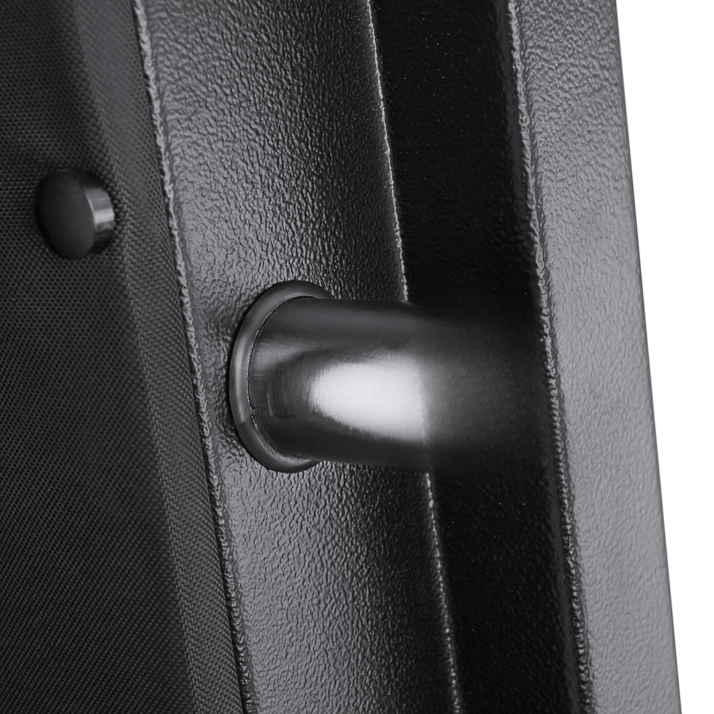 Black textured metal safe door detail with chrome handle