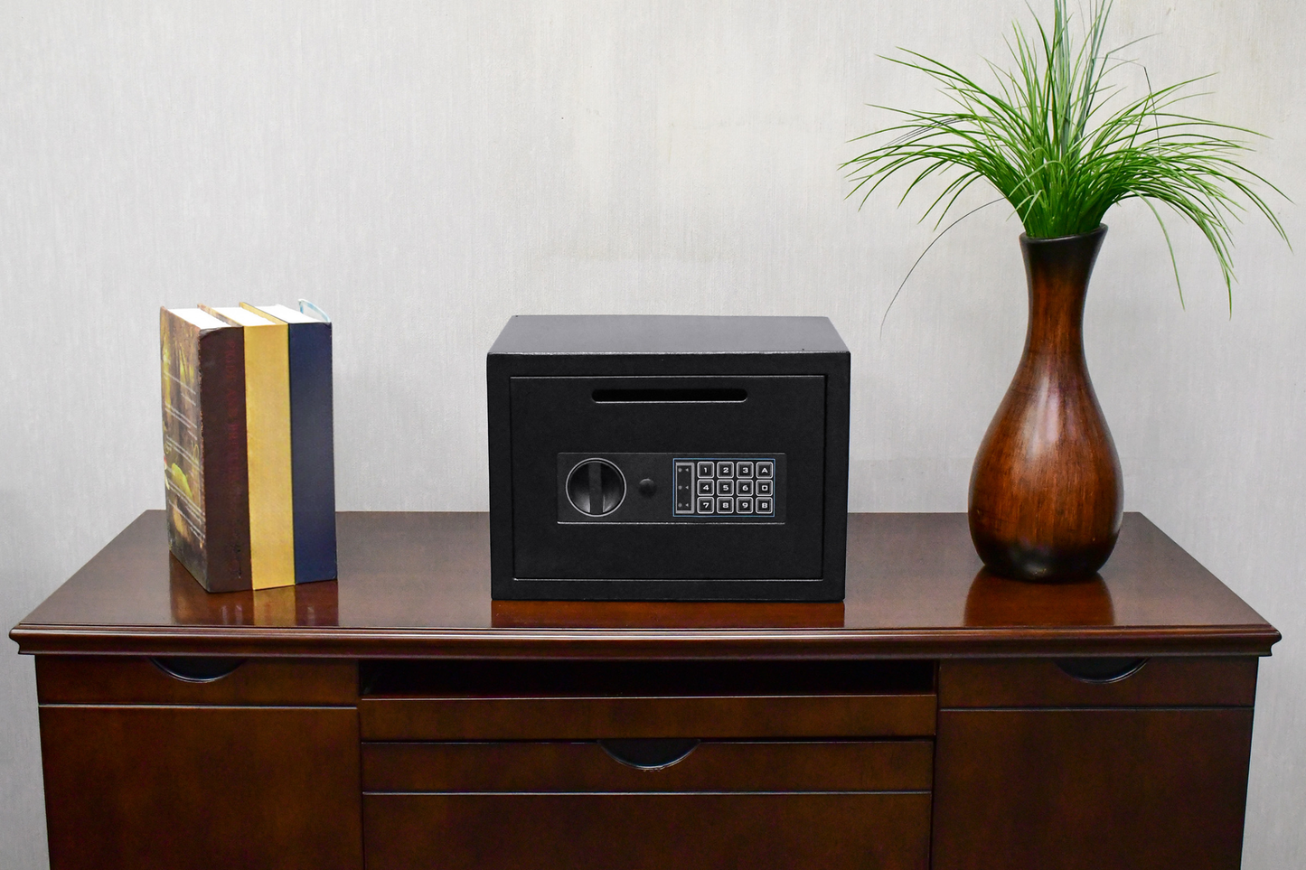 Black digital safe with coin slot and keypad