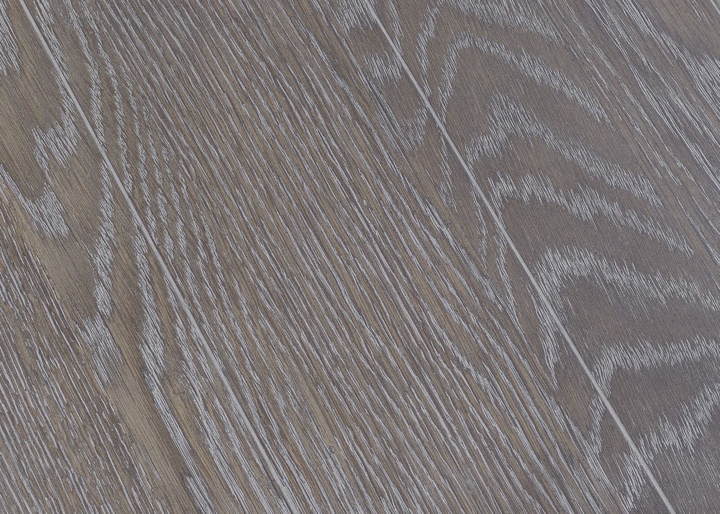 Closeup of distressed grey oak wood grain flooring