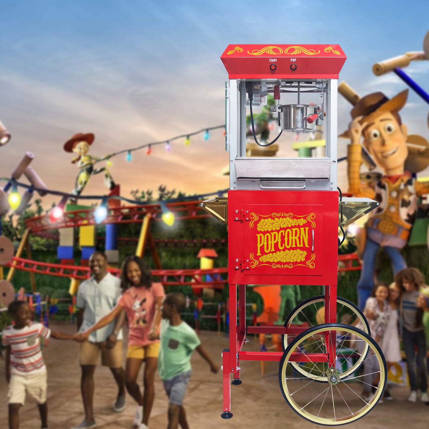 Red classic popcorn machine with ornate yellow detailing