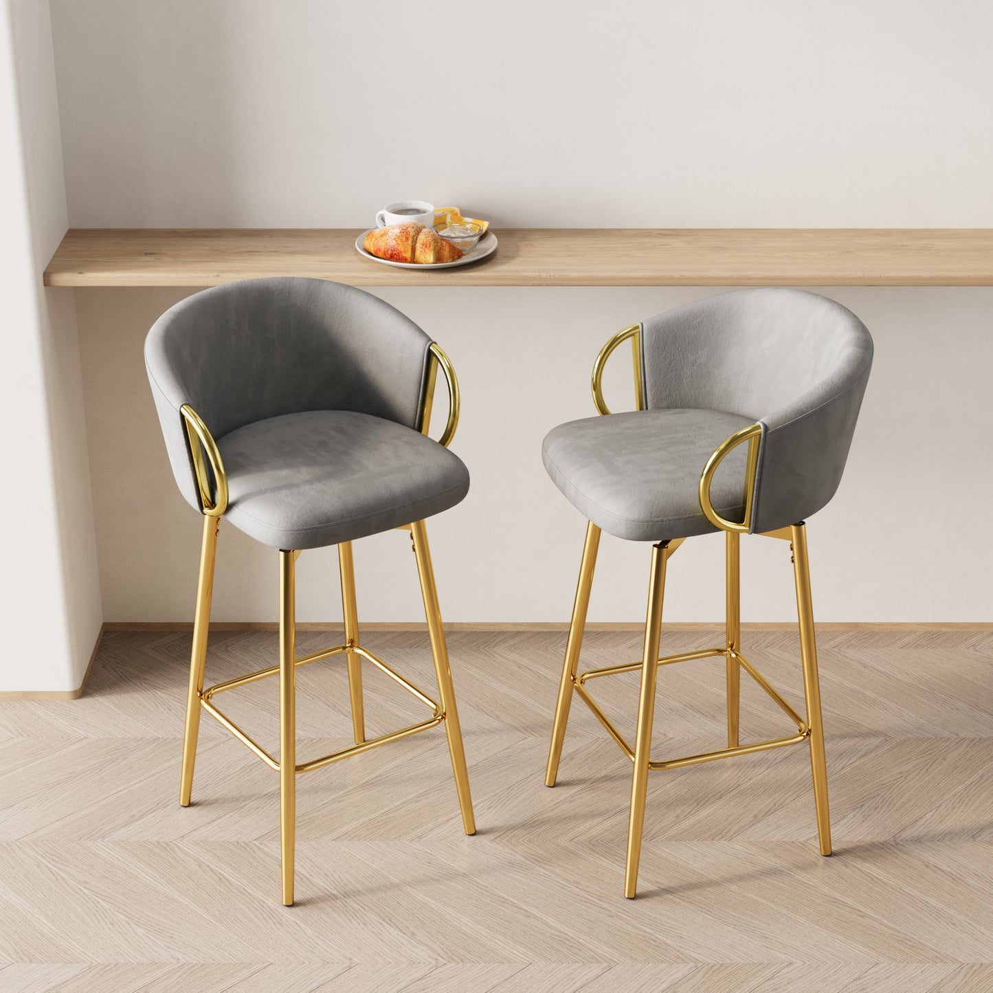 Grey velvet bar stool with gold legs and armrests