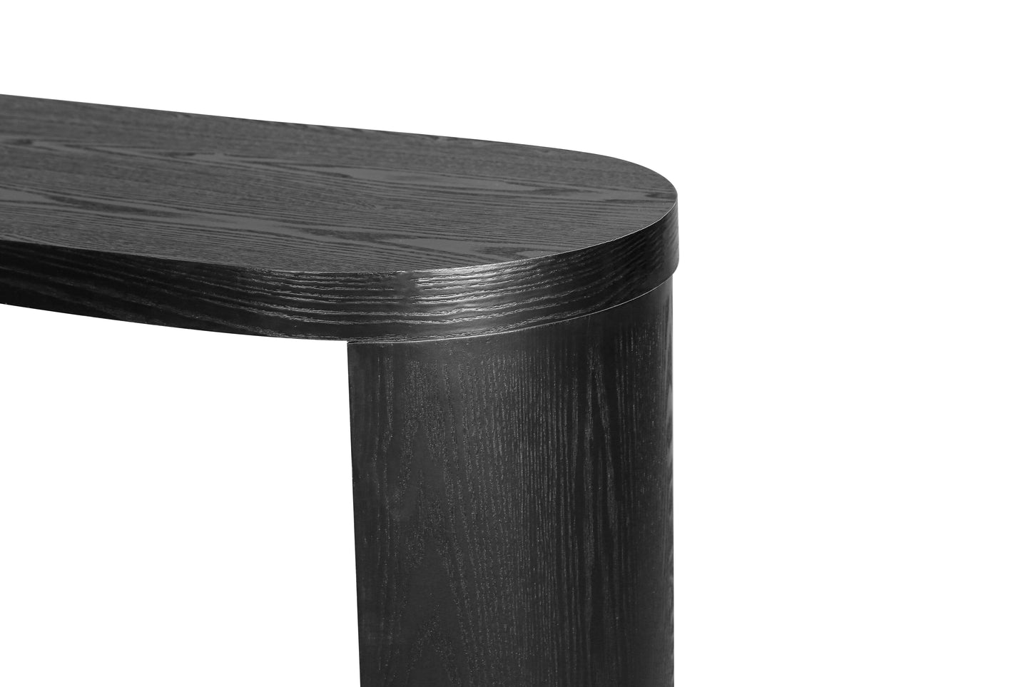 Closeup of a black oak console table with a rounded edge