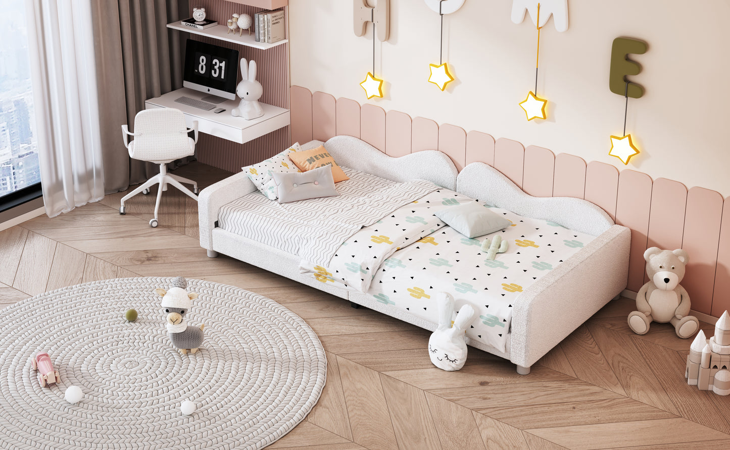 White toddler bed with cactusthemed bedding