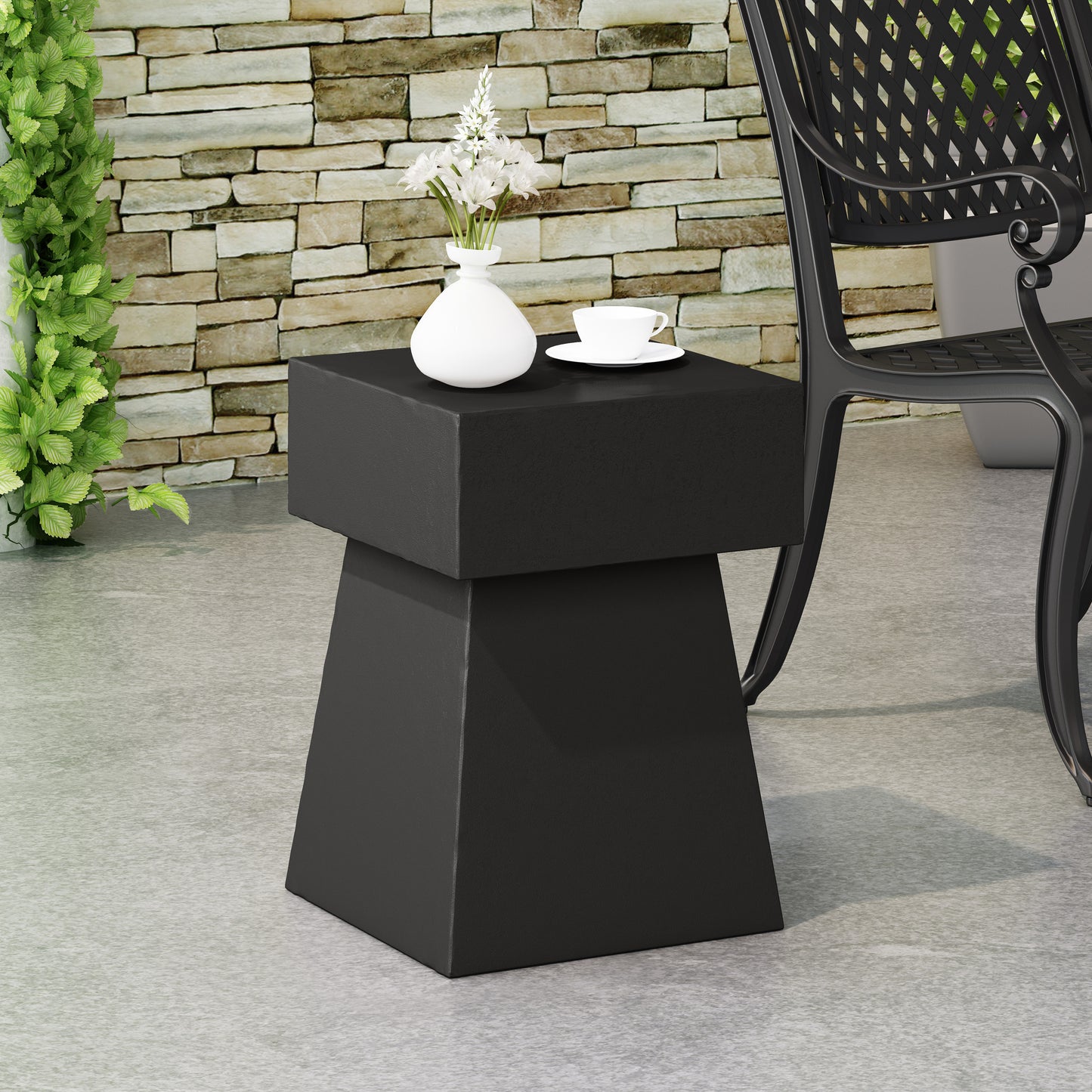 Modern black geometric accent table with clean lines perfect for patio use