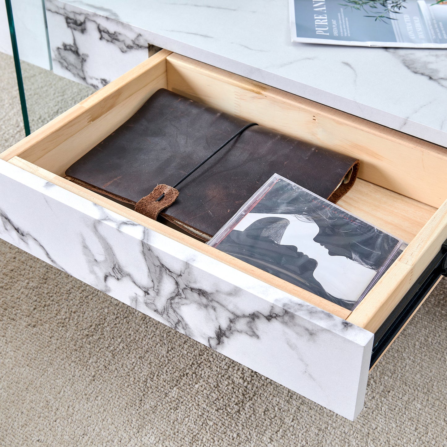 Marble effect drawer with leather journal and CD case