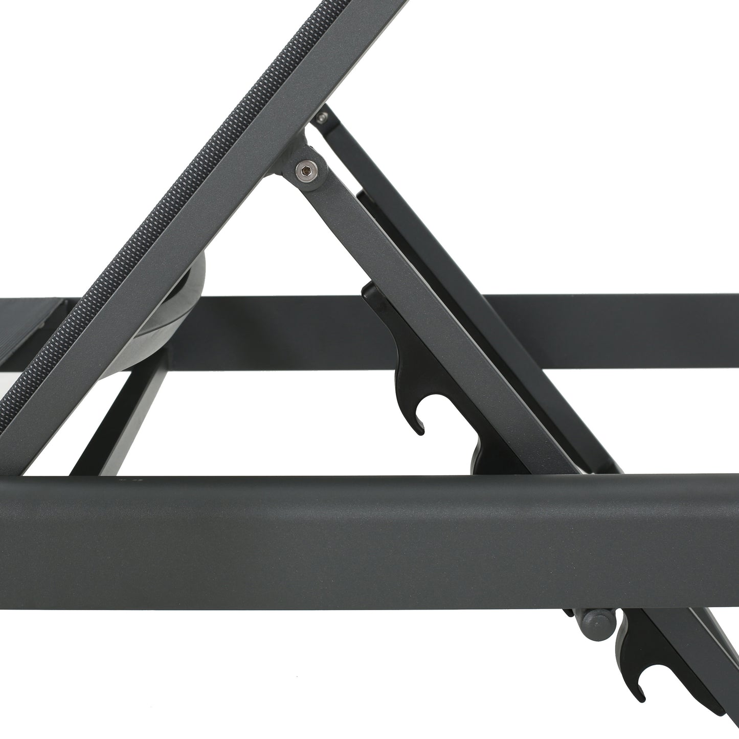 Closeup of dark gray metal frame with textured black fabric detail on a lounge chair