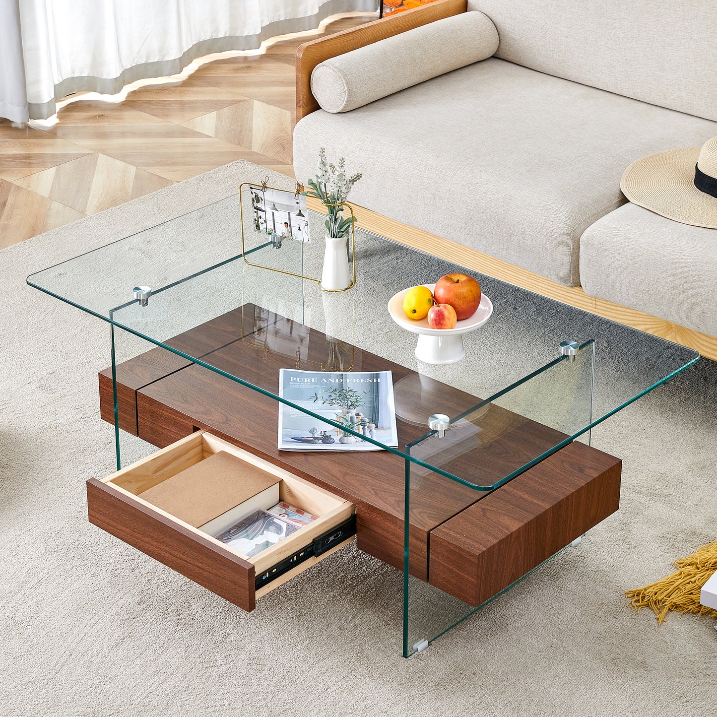 Modern glass and walnut coffee table with open drawer