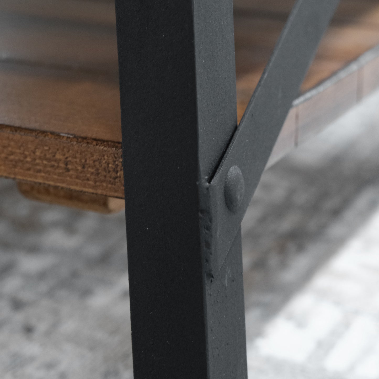 Black metal frame with wood shelf support