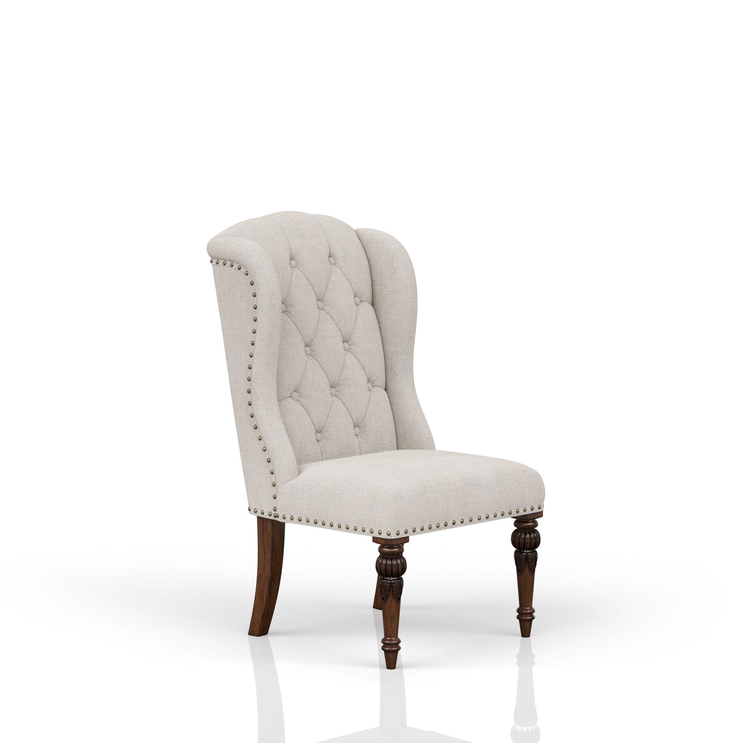 Tufted beige fabric accent chair with brass nailhead trim and carved wooden legs