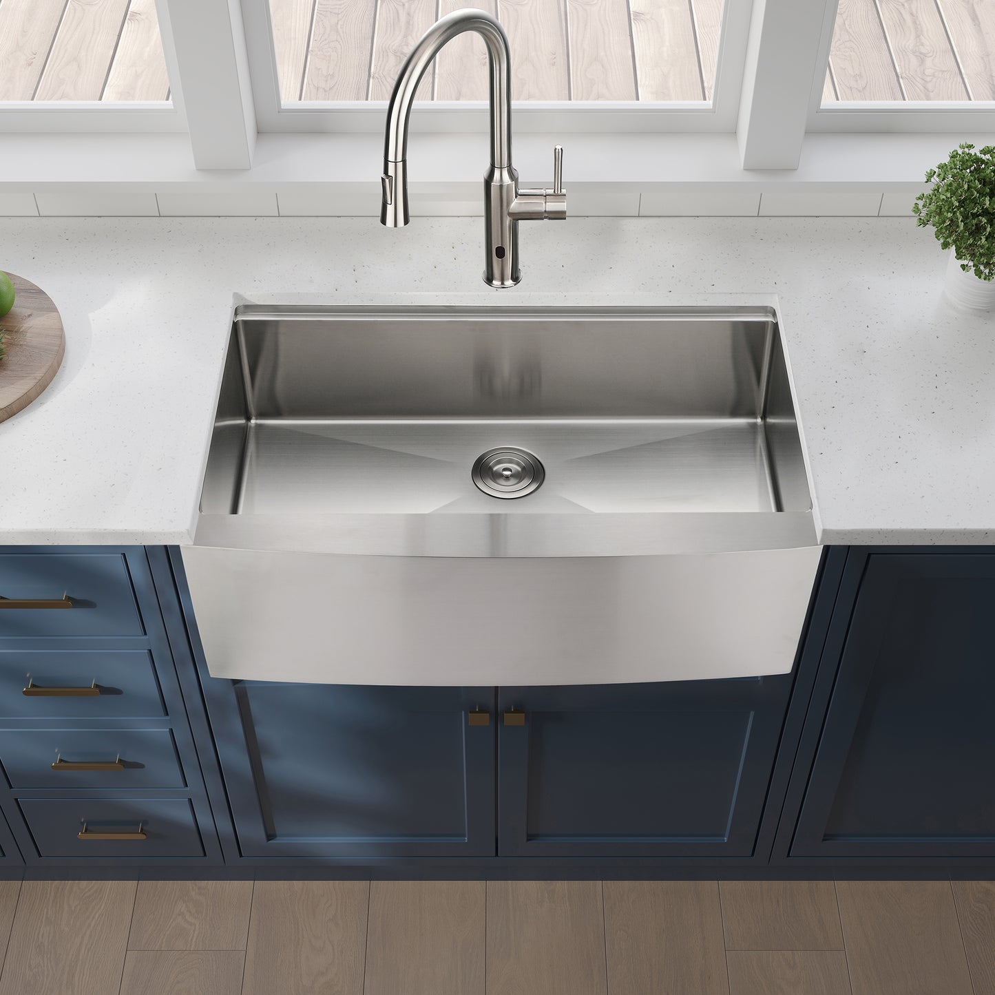 Stainless steel farmhouse kitchen sink with brushed nickel faucet