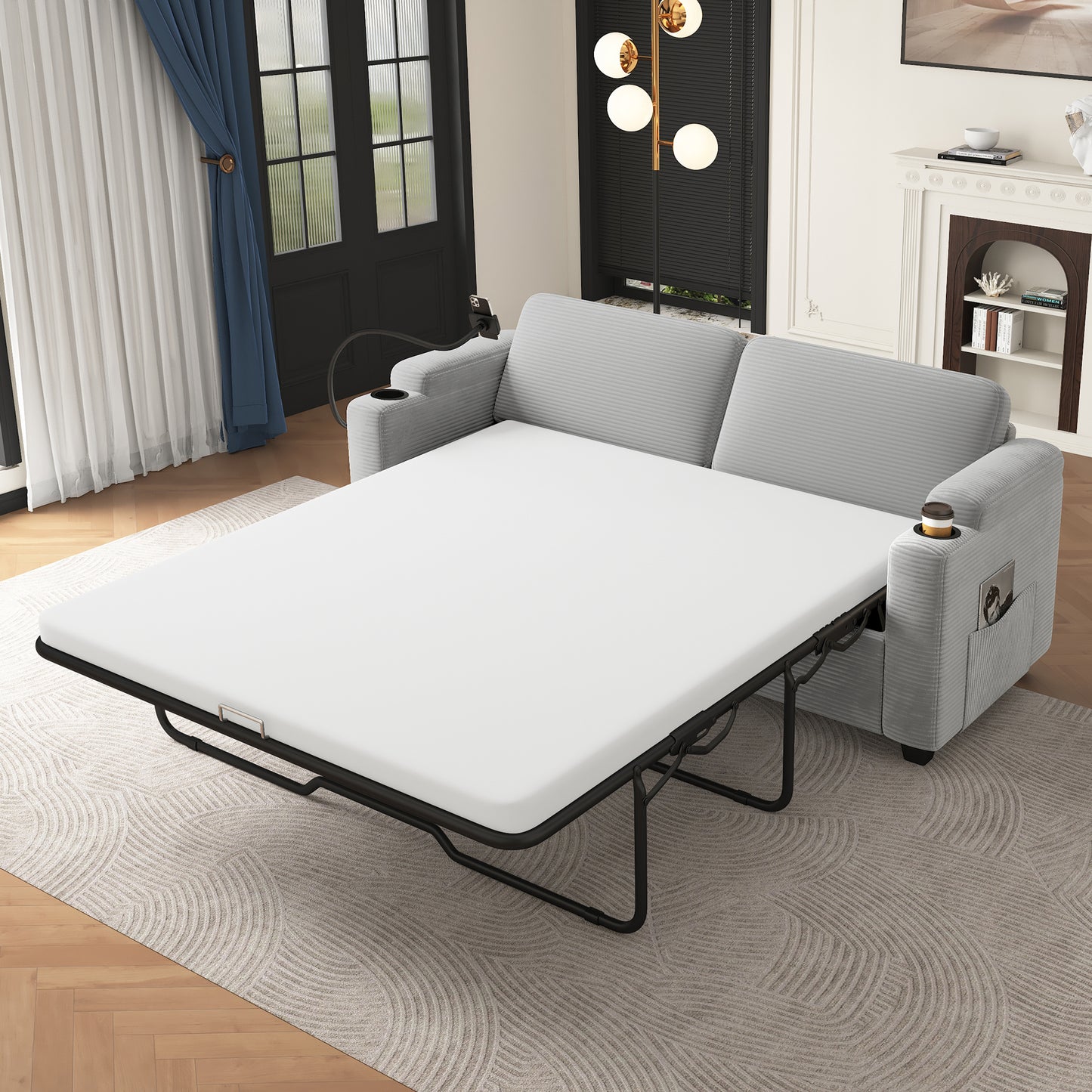 Gray corduroy sofa bed with pullout mattress and builtin cup holder