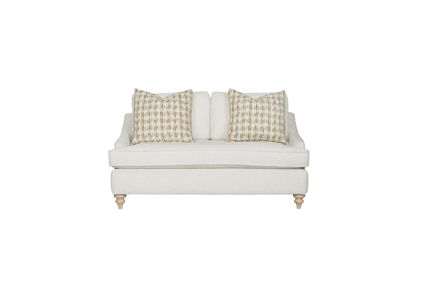 Cream boucle loveseat with geometric patterned accent pillows and turned wooden legs modern farmhouse style
