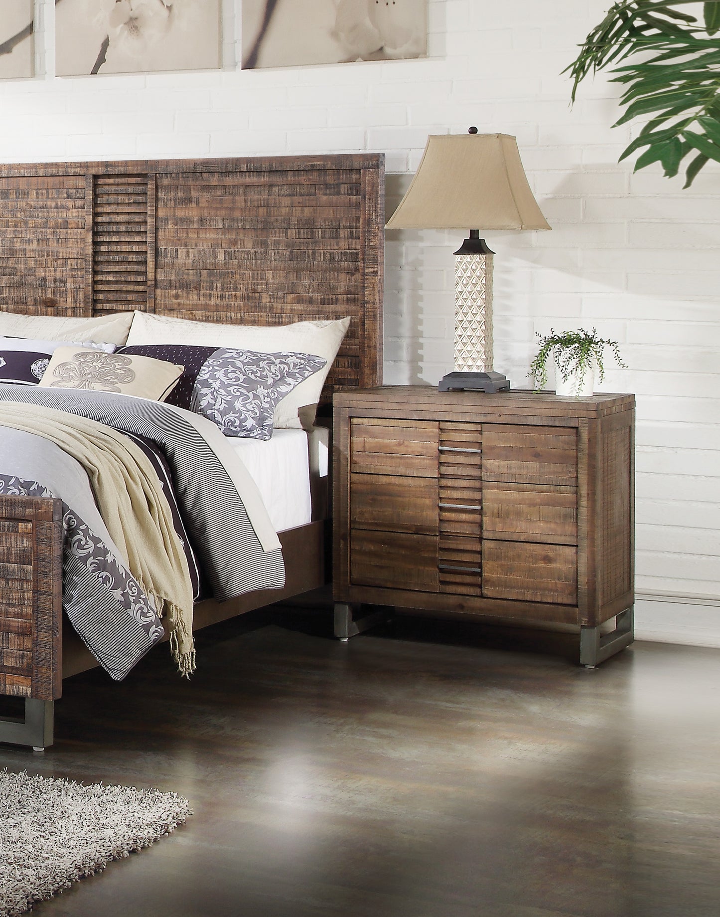 Rustic wood nightstand with three drawers and metal accents