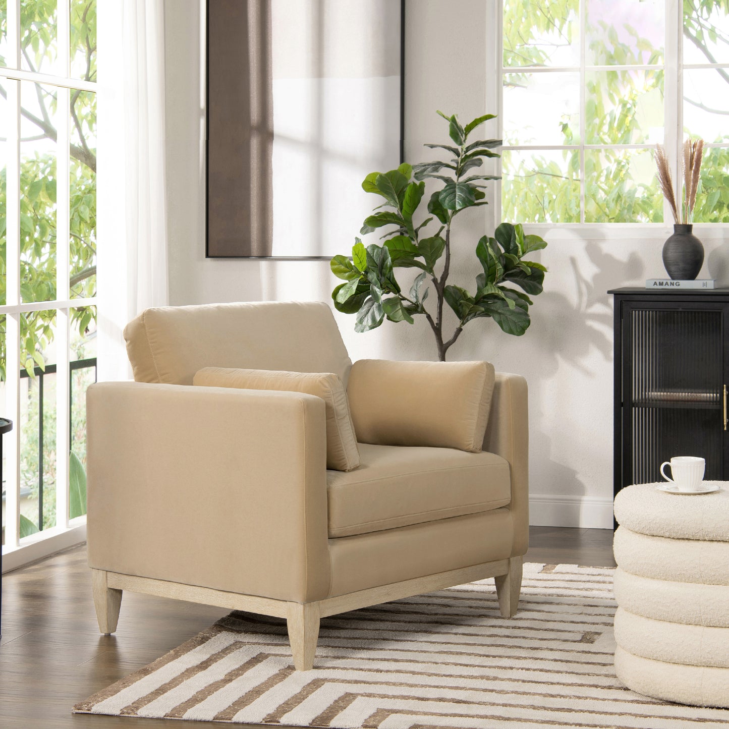 Cozy beige accent chair with plush cushions and light wood legs