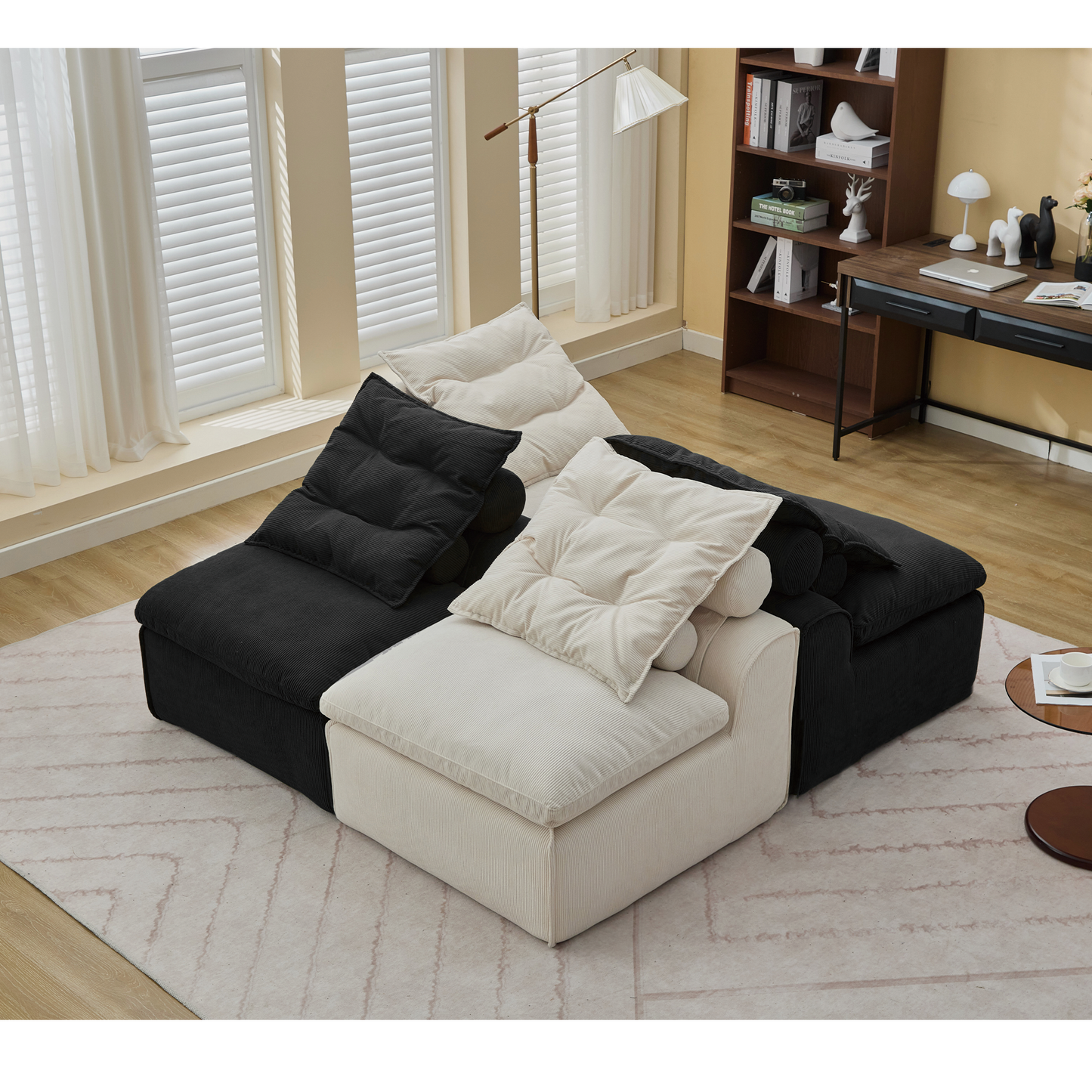Black and cream corduroy sectional sofa with plush cushions