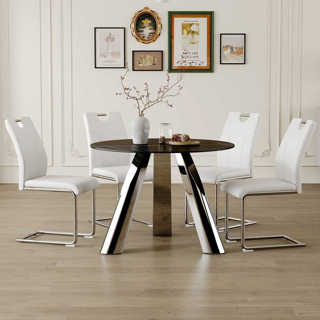 Modern white dining chairs around a round black marble dining table