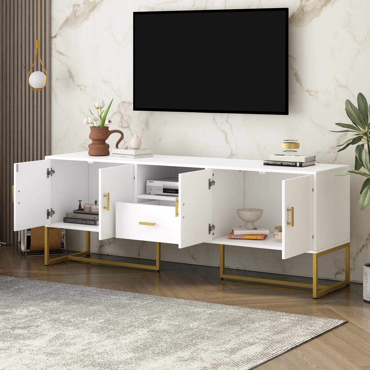 White media console with gold legs and textured doors