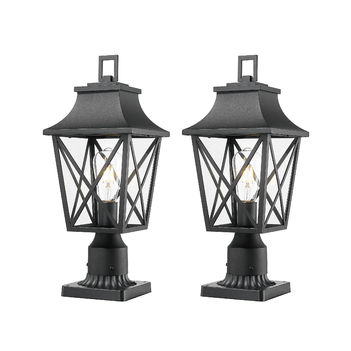 Two black metal outdoor post lights with clear glass panes and exposed Edison bulbs