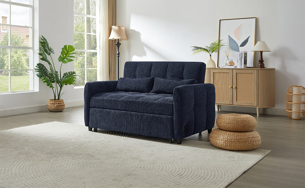 Navy blue upholstered sofa bed with tufted back cushions