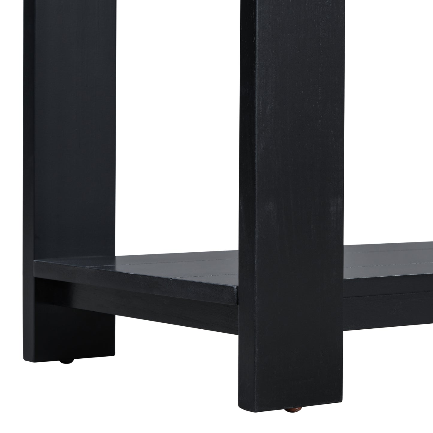 Closeup of dark wood console table legs and bottom shelf