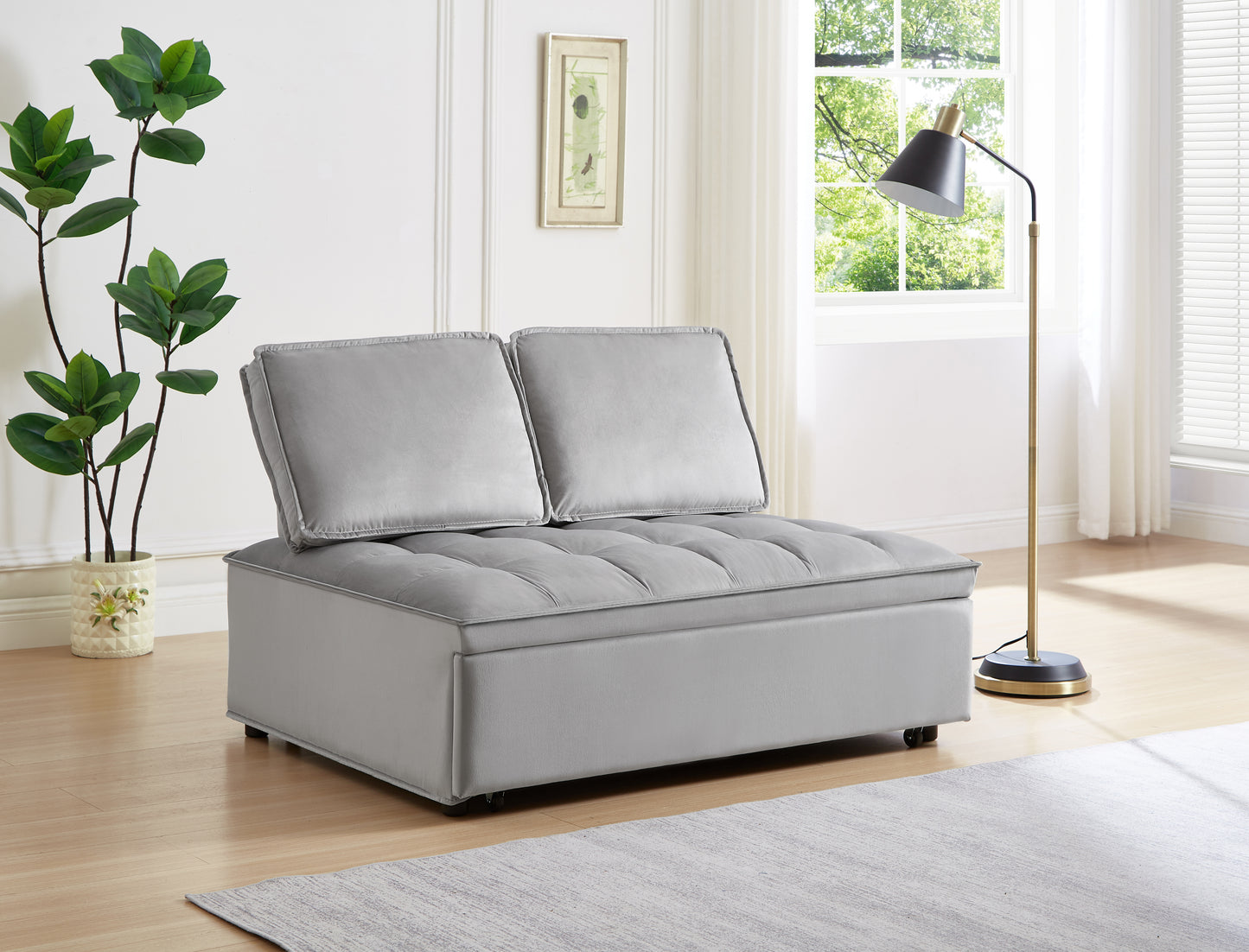 Gray velvet upholstered convertible chair with tufted seat and plush back cushions ideal for small spaces